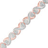 Thumbnail Image 1 of Diamond Accent Solitaire "X" Heart Bracelet in Sterling Silver and 18K Rose Gold Plate - 7.25"