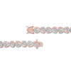 Thumbnail Image 2 of Diamond Accent Solitaire "X" Heart Bracelet in Sterling Silver and 18K Rose Gold Plate - 7.25"