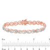 Thumbnail Image 3 of Diamond Accent Solitaire "X" Heart Bracelet in Sterling Silver and 18K Rose Gold Plate - 7.25"