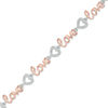 Thumbnail Image 1 of Diamond Accent &quot;love&quot; Heart Bracelet in Sterling Silver and 10K Rose Gold Plate - 7.25&quot;