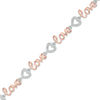 Thumbnail Image 0 of Diamond Accent "love" Heart Bracelet in Sterling Silver and 10K Rose Gold Plate - 7.25"