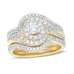 1 CT. T.W. Diamond Bypass Swirl Frame Three Piece Bridal Set in 14K Gold