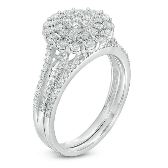 1/4 CT. T.w. Composite Diamond Flower Bridal Set in Sterling Silver