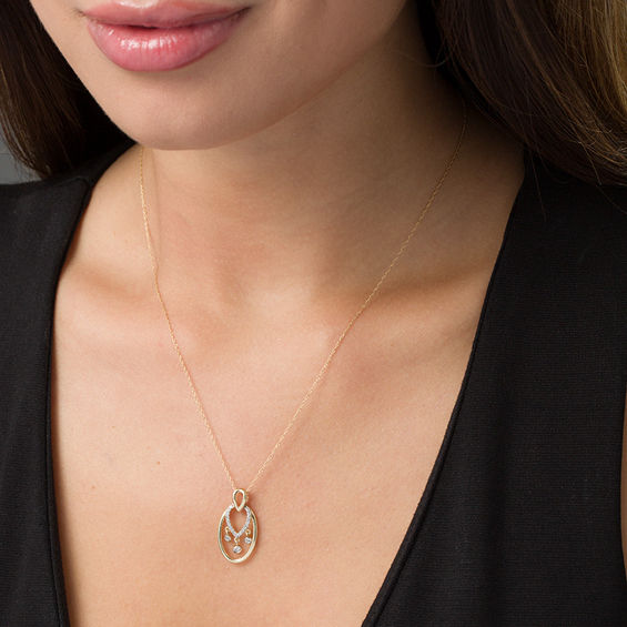 1/8 CT. T.w. Diamond Teardrop and Oval Dangle Pendant in 10K Gold