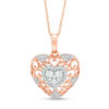 Thumbnail Image 1 of 1/4 CT. T.W. Diamond Filigree Heart Pendant in 10K Two-Tone Gold