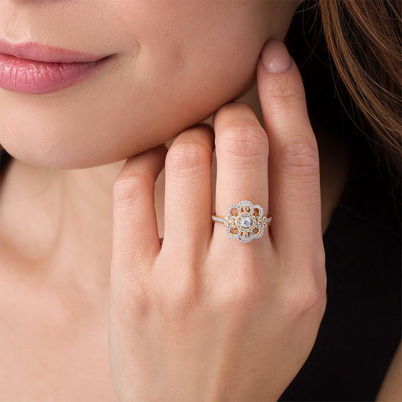1/2 CT. T.w. Diamond Flower Ring in 10K Gold