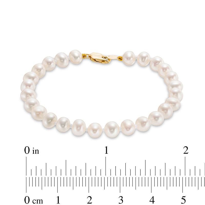 Main Image 3 of Child's 4.5-5.0mm Freshwater Cultured Pearl Strand Bracelet with 14K Gold Clasp-5.25"
