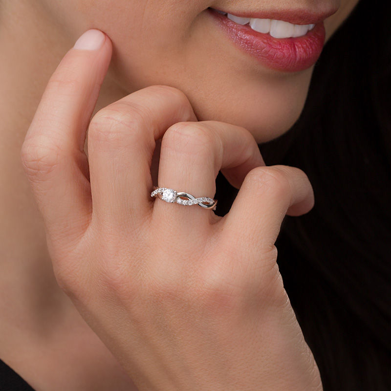 Petite Twist Diamond Engagement Ring in Platinum (1/10 ct. tw.)