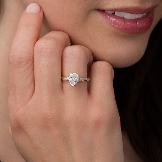 3/8 CT. T.w. Pear-Shaped Diamond Frame Twist Engagement in 10K Gold