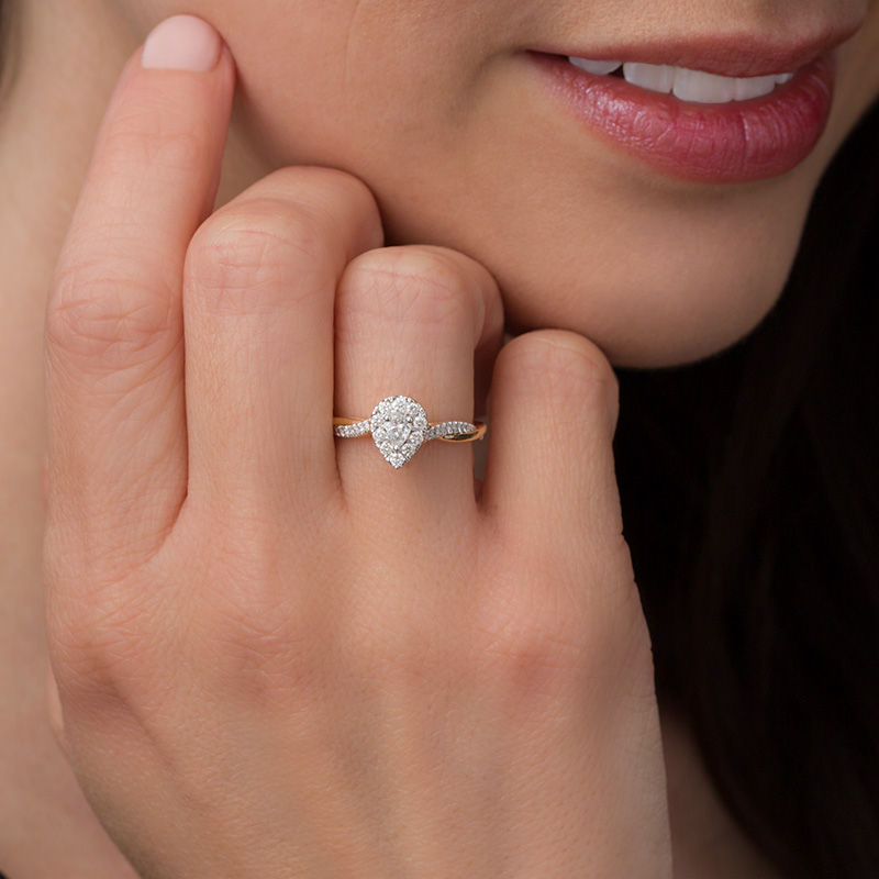 Main Image 3 of 3/8 CT. T.W. Pear-Shaped Diamond Frame Twist Engagement in 10K Gold
