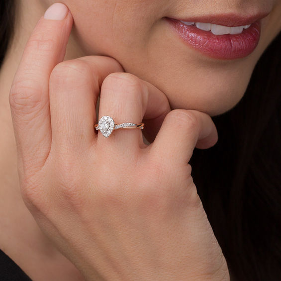 3/8 CT. T.w. Pear-Shaped Diamond Frame Twist Engagement in 10K Rose Gold