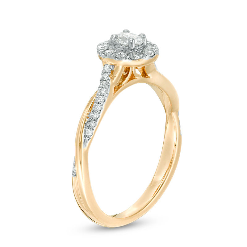 Main Image 2 of 3/8 CT. T.W. Oval Diamond Frame Twist Engagement Ring in 10K Gold