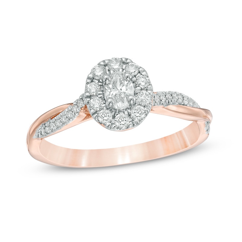Main Image 1 of 3/8 CT. T.W. Oval Diamond Frame Twist Engagement Ring in 10K Rose Gold