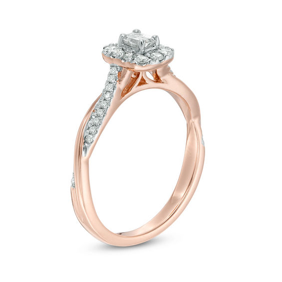 3/8 CT. T.w. Emerald-Cut Diamond Frame Twist Engagement Ring in 10K Rose Gold