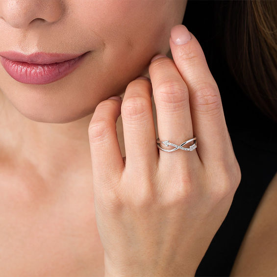 1/20 CT. T.w. Diamond Crossover Arrow Ring in Sterling Silver