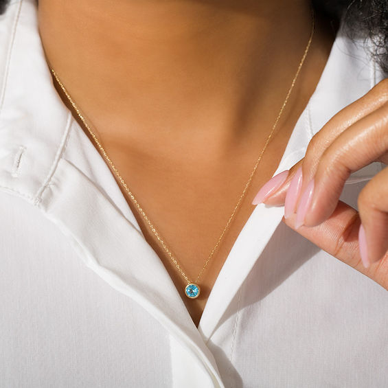5.0mm Bezel-Set Swiss Blue Topaz and Filigree Pendant in 10K Gold