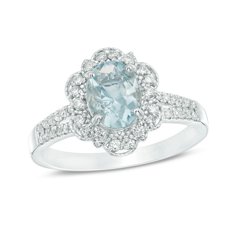 Main Image 1 of Oval Aquamarine and 1/4 CT. T.W. Diamond Flower Frame Vintage-Style Ring in 14K White Gold