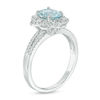 Thumbnail Image 1 of Oval Aquamarine and 1/4 CT. T.W. Diamond Flower Frame Vintage-Style Ring in 14K White Gold