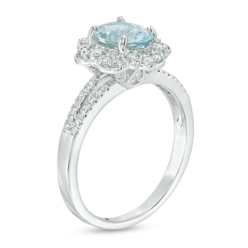 Main Image 2 of Oval Aquamarine and 1/4 CT. T.W. Diamond Flower Frame Vintage-Style Ring in 14K White Gold