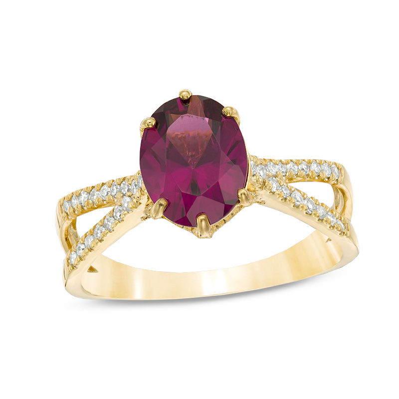 Oval Grape Garnet and 1/4 CT. T.W. Diamond Split Shank Ring in 14K Gold