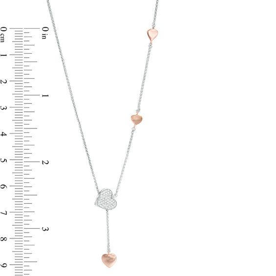 1/6 CT. T.W. Diamond Heart Station Lariat Necklace in Sterling Silver and 10K Rose Gold - 26" 1/6 CT. T.W. Diamond Heart Station Lariat Necklace in Sterling Silver and 10K Rose Gold - 26"