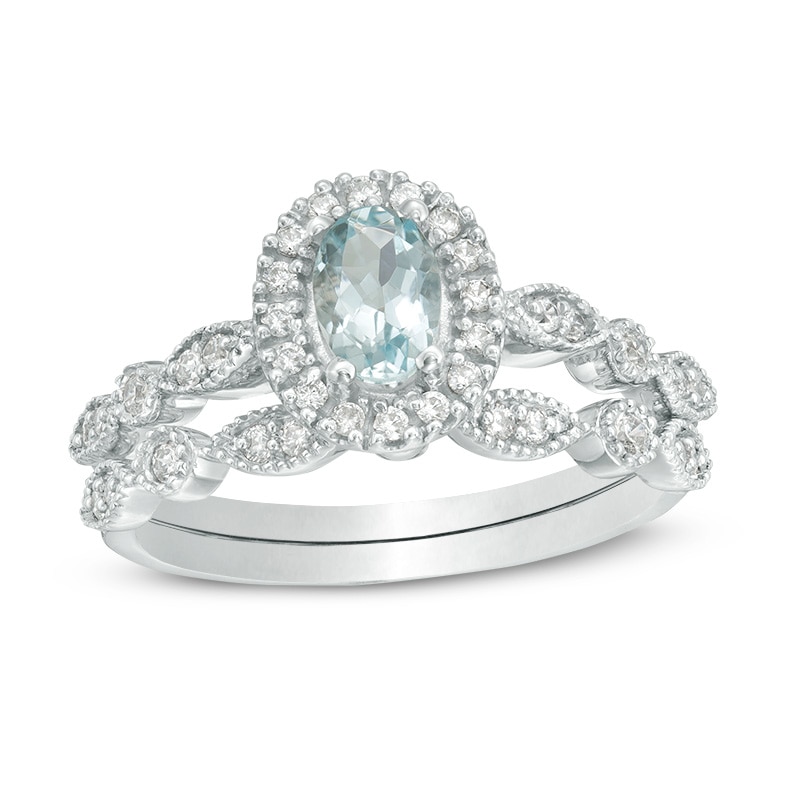 Main Image 1 of Oval Aquamarine and 1/5 CT. T.W. Diamond Frame Vintage-Style Bridal Set in 10K White Gold