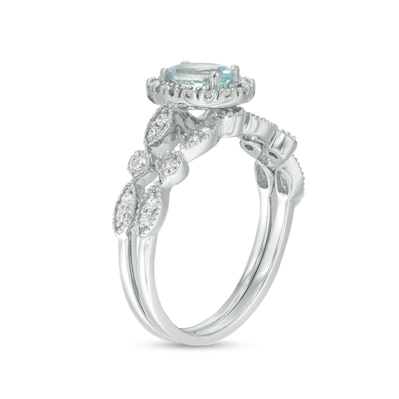 Main Image 3 of Oval Aquamarine and 1/5 CT. T.W. Diamond Frame Vintage-Style Bridal Set in 10K White Gold