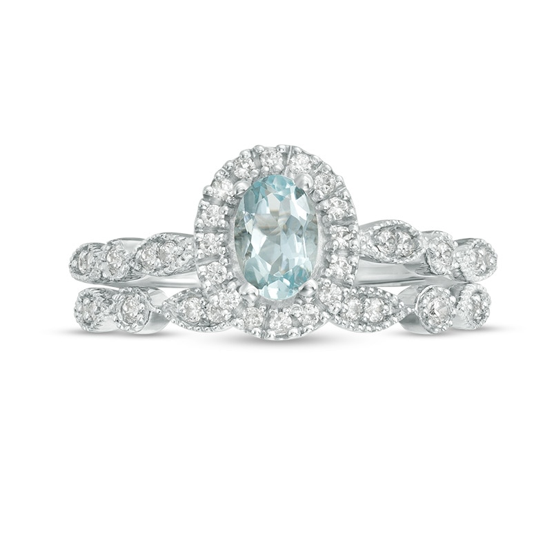 Oval Aquamarine and 1/5 CT. T.W. Diamond Frame Vintage-Style Bridal Set in 10K White Gold