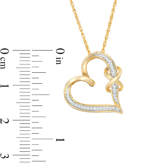 1/15 CT. T.w. Diamond Infinity Knot Tilted Heart Pendant in Sterling Silver with 14K Gold Plate