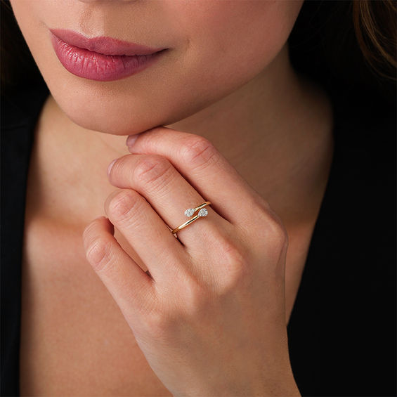 1/15 CT. T.w. Diamond Teardrop Bypass Adjustable Ring in 10K Gold - Size 7