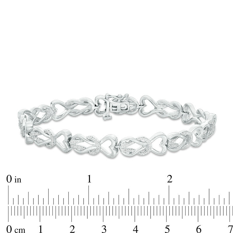 1/2 CT. T.W. Diamond Heart Double Knot Bracelet in Sterling Silver Zales