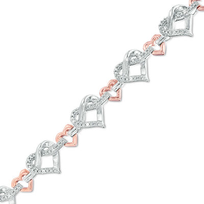 1 10 Ct T W Diamond Love Knot Heart Bracelet In Sterling Silver And 10k Rose Gold Zales