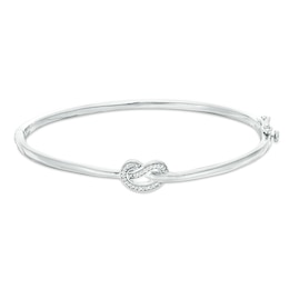 1/15 CT. T.W. Diamond Love Knot Pretzel Bangle in Sterling Silver