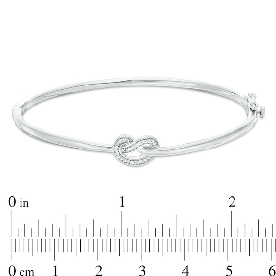 1/15 CT. T.w. Diamond Love Knot Pretzel Bangle in Sterling Silver