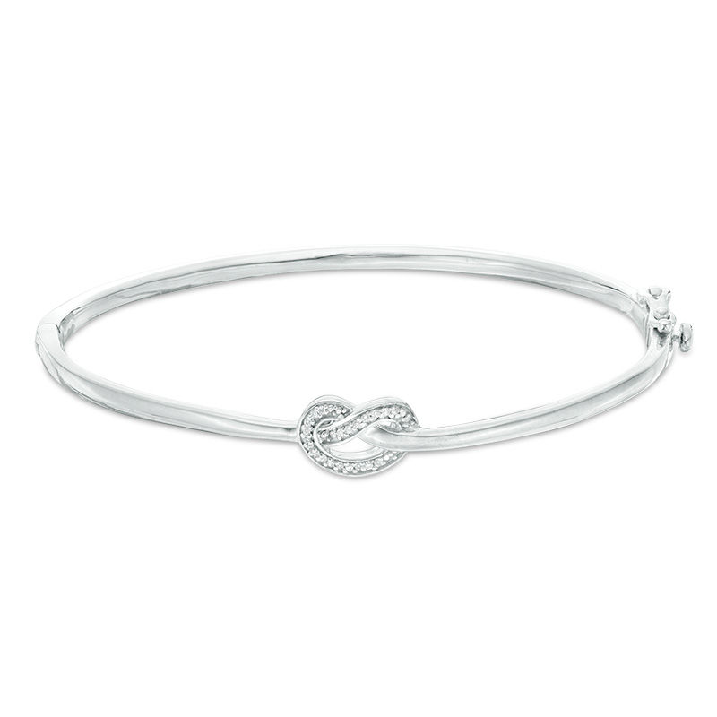 1/15 CT. T.W. Diamond Love Knot Pretzel Bangle in Sterling Silver