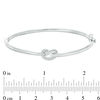 Thumbnail Image 1 of 1/15 CT. T.W. Diamond Love Knot Pretzel Bangle in Sterling Silver