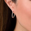 Thumbnail Image 2 of 1/2 CT. T.W. Diamond Inside-Out Hoop Earrings in 10K White Gold