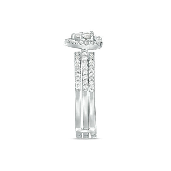 1/2 CT. T.w. Diamond Heart Frame Three Piece Bridal Set in 10K White Gold