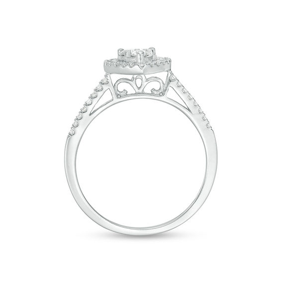 1/2 CT. T.w. Diamond Heart Frame Three Piece Bridal Set in 10K White Gold
