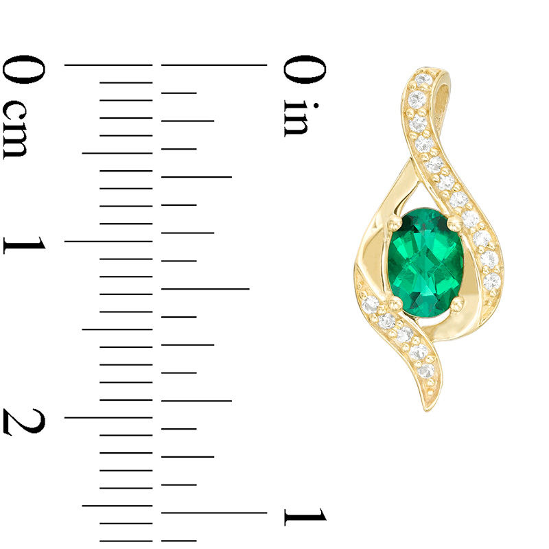 Main Image 3 of Oval Lab-Created Emerald and White Sapphire Flame Stud Earrings in 10K Gold