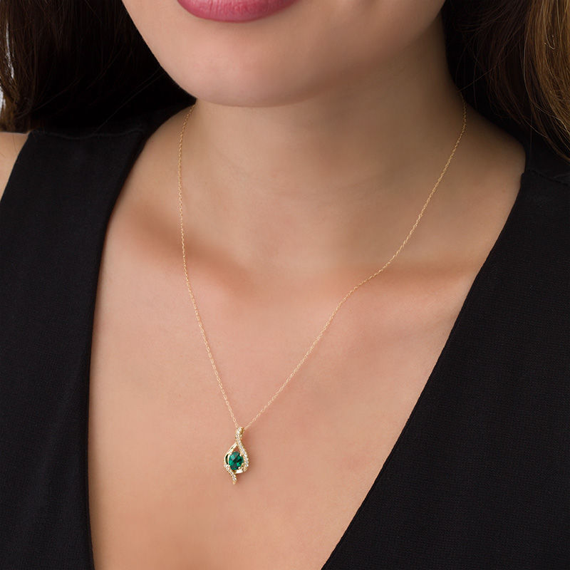 Oval Lab-Created Emerald and White Sapphire Flame Pendant in 10K Gold
