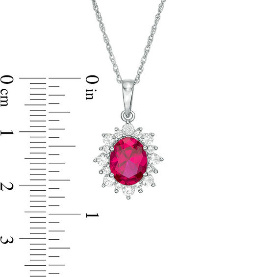 Oval Lab-Created Ruby and White Sapphire Starburst Frame Pendant and Stud Earrings Set in Sterling Silver