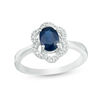 Thumbnail Image 1 of Oval Blue Sapphire and 1/15 CT. T.W. Scallop Frame Floral Ring in 10K White Gold