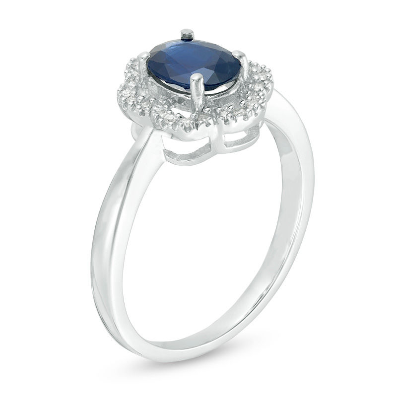 Oval Blue Sapphire and 1/15 CT. T.W. Scallop Frame Floral Ring in 10K White Gold
