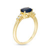 Thumbnail Image 2 of Oval Blue Sapphire and 1/10 CT. T.W. Diamond Ring in 10K Gold