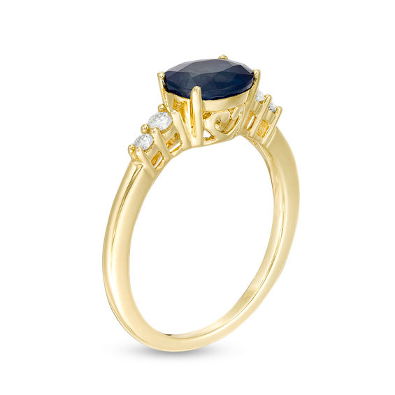 Oval Blue Sapphire and 1/10 CT. T.w. Diamond Ring in 10K Gold