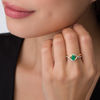 Thumbnail Image 3 of Oval Emerald and 1/10 CT. T.W. Diamond Swirl Frame Bypass Ring in 10K Gold
