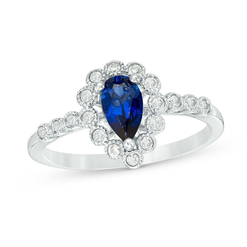 Main Image 1 of Pear-Shaped Blue Sapphire and 1/10 CT. T.W. Diamond Frame Vintage-Style Ring in 10K White Gold
