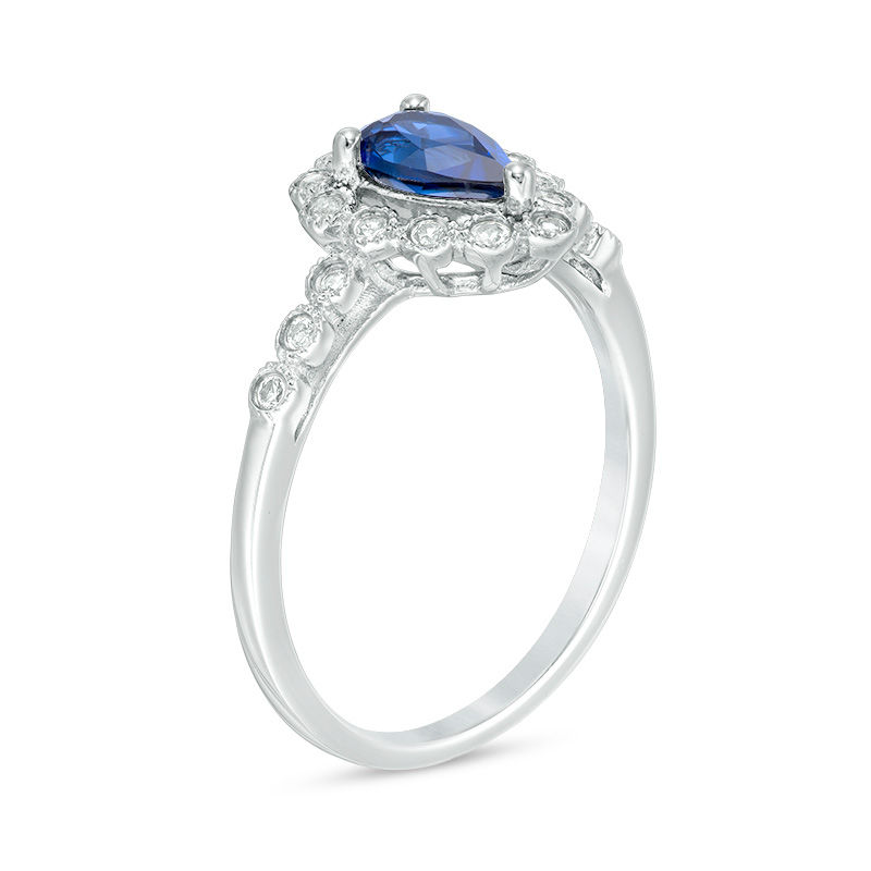 Main Image 2 of Pear-Shaped Blue Sapphire and 1/10 CT. T.W. Diamond Frame Vintage-Style Ring in 10K White Gold