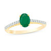 Thumbnail Image 1 of Oval Emerald and 1/6 CT. T.W. Diamond Beaded Ring in 10K Gold